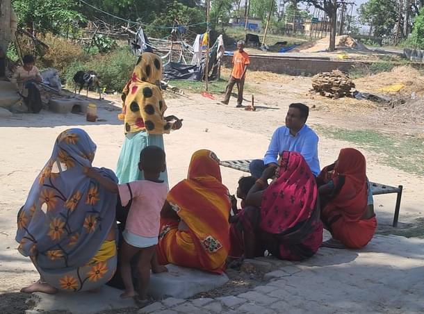 Banuchandar Nagarajan in Domariyaganj, a small hamlet in Uttar Pradesh, talking to local women.