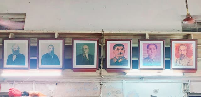 From left to right: Karl Marx, Friedrich Engels, Vladimir Lenin, Joseph Stalin, Mao Tse Tung, and Chiang-Kai-Shek