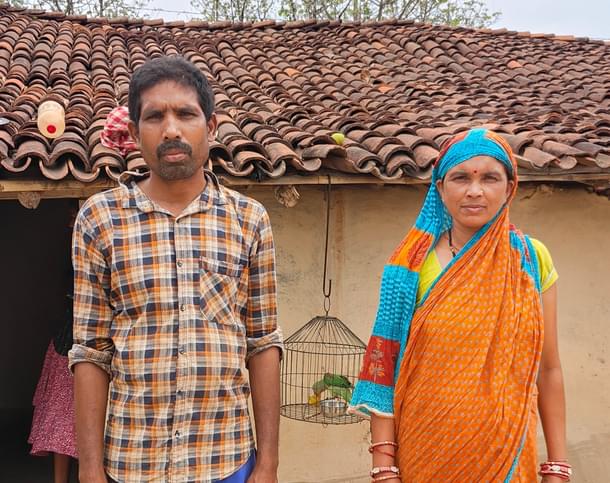 Rina Patel with her husband Umesh in front of their house