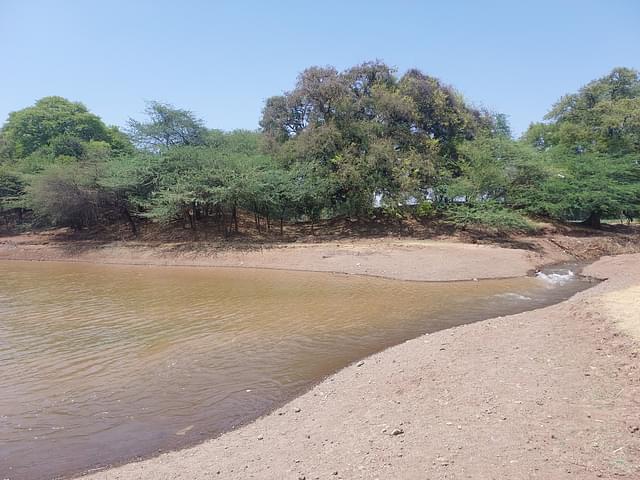 Water from the Janai-Shirsai Lift Irrigation Scheme flowing into a lake near Supa.