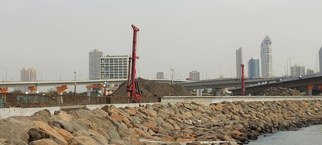 Mounds of rubble brought from the Navi Mumbai International Airport site kept ready for reclaiming the sea in further packages of the Coastal Road Project.