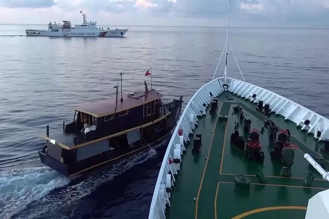 Chinese Coast Guard vessel preventing a Philippines re-supply mission to Sierra Madre. (Pic via Reuters)