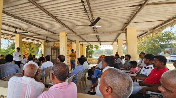 Dhaval Patel's public meeting at a local temple.