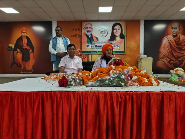 Bansuri, seated on the dias.