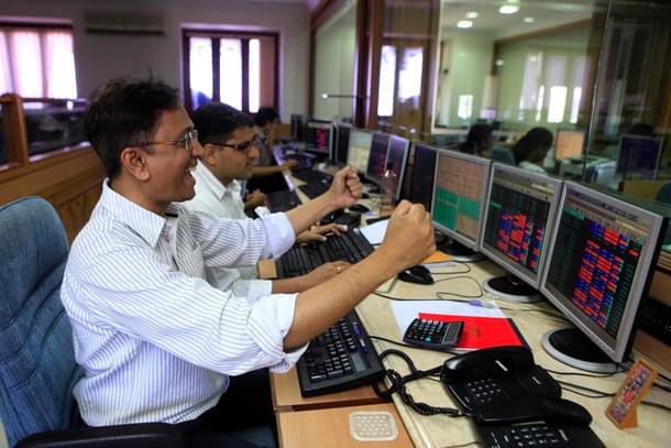 Traders rejoice as Sensex surges at Bombay Stock Exchange. (Anshuman Poyrekar/Hindustan Times via Getty Images)