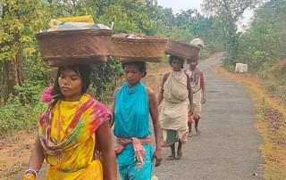 Women of Phuldumer village returning from Lanjigarh on foot after selling their meagre agriculture produce.
