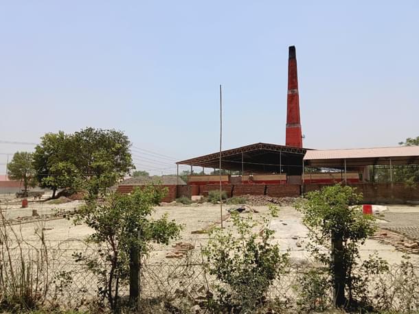 A chimney with bricks outside