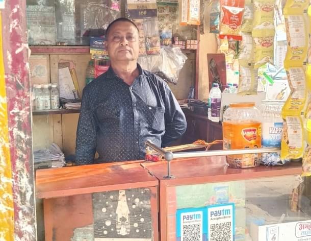 Nabin Das, owner of a small store selling tobacco products.