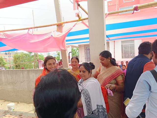 Shambhavi getting felicitated by women.