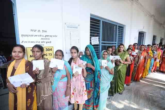 Voters in a queue at a polling station in UP (Pic Via Election Commission)