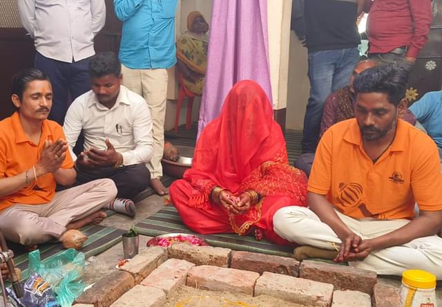 A picture of the couple's 'ghar wapsi' ritual in February 2024