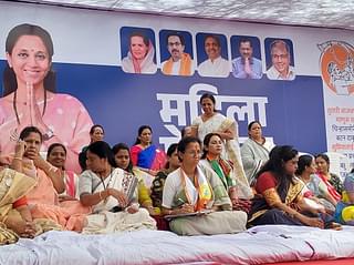 Supriya Sule, Baramati's incumbent Lok Sabha MP seated amidst members of the NCP-SP's Women's Cell. Sule is contesting for Baramati the fourth time after being elected three times in a row from the same seat.