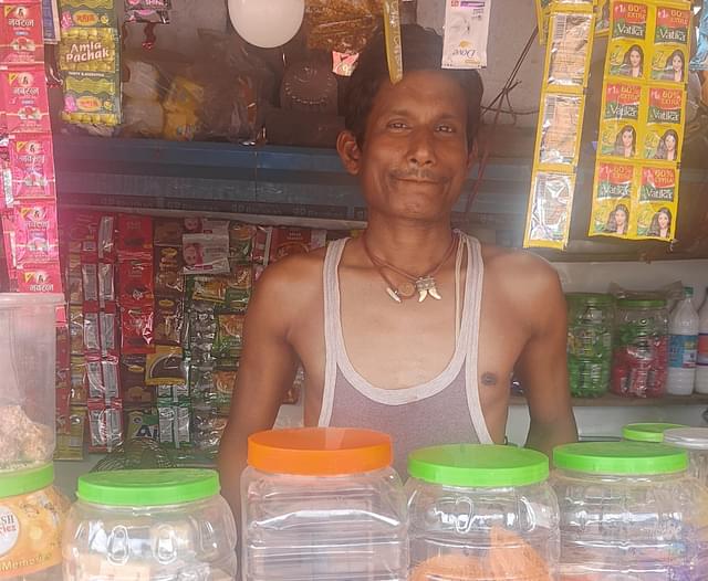 Girija Behere in his small shop at Bisheshwar Basti.
