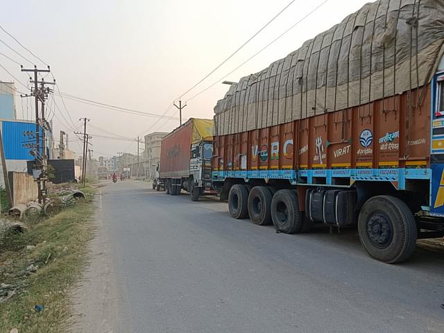 Trucks ready to transport finished products from industrial area