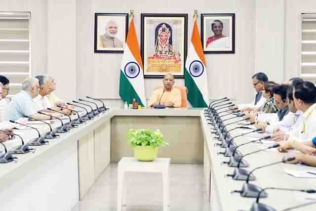 UP CM Yogi chairing a meeting with officials (Pic Via Twitter)