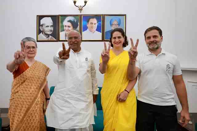 Congress leaders (from L to R) Sonia Gandhi, Mallikarjun Kharge, Priyanka Gandhi Vadra and Rahul Gandhi showing victory sign