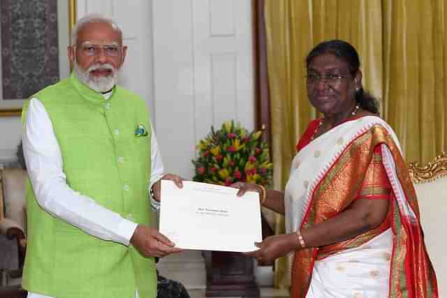 PM Narendra Modi submitting resignation to President Droupadi Murmu