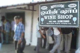 People lined up outside a TASMAC outlet.