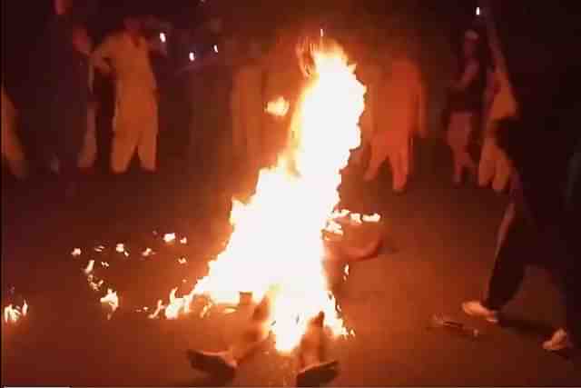 Man burnt alive in front of police station