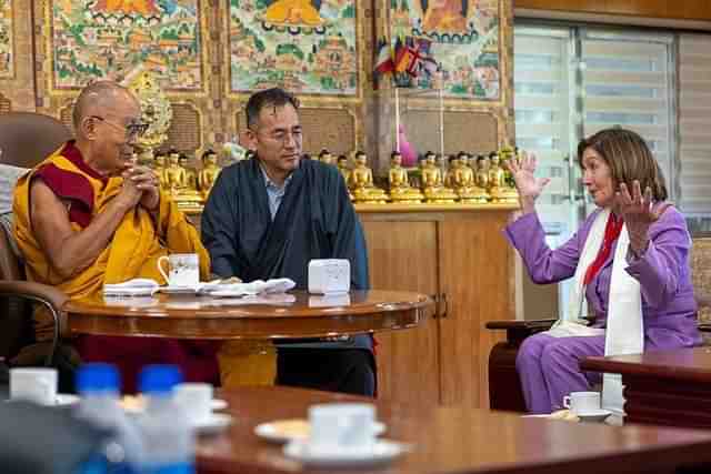 Nancy Pelosi with the Dalai Lama.