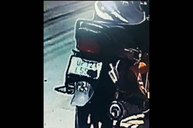 Still showing last two digits of his bike number taped