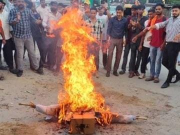 Effigy of the accused being burnt on Tuesday.