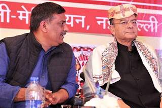 Sanjay Kumar Jha with Arun Jaitley (right)