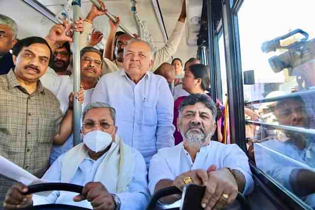 CM Siddaramaiah, DyCM D K Shivakumar and Transport Minister Ramalinga Reddy at the inauguration of new electric buses in Vidhana Soudha. (X/RLR_BTM)