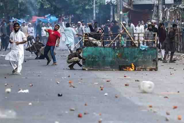 Islamists rioting on the streets of Dhaka last week.