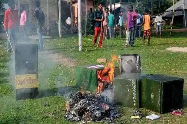 Ballot boxes allegedly snatched by TMC cadre from a polling booth at Malda being burnt during the 2018 panchayat polls.