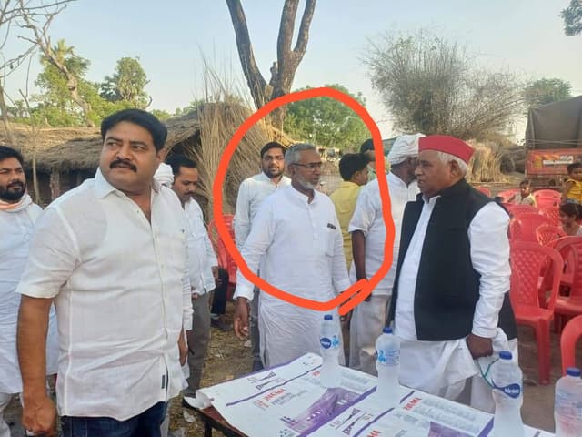 The one circled is Moeed Khan. On Khan's left is Faizabad MP Awadhesh Prasad
