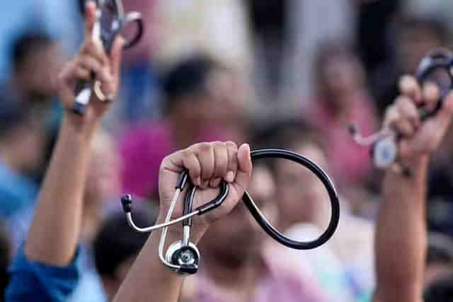 Striking junior doctors display their stethoscopes