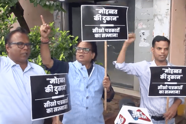 Ashok Srivastav protesting against attack on India Today journalist in US