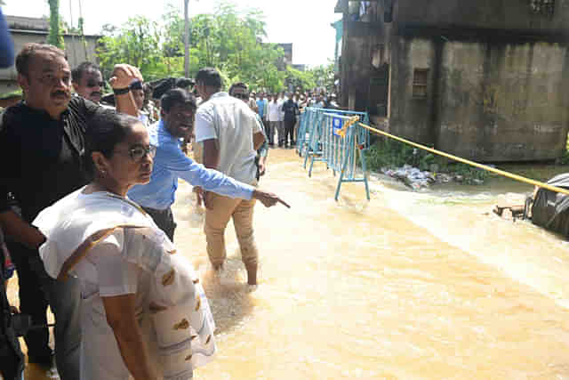 Mamata Banerjee inspecting the flooding in Bengal