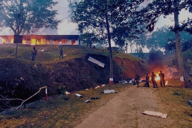 An Assam Rifles camp set on fire by angry Nagas after the botched army operation at Oting in Mon district