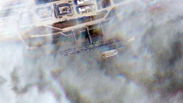 Image taken on May 29 where a submarine is moored just two weeks before the four barges appeared. (Planet Labs)