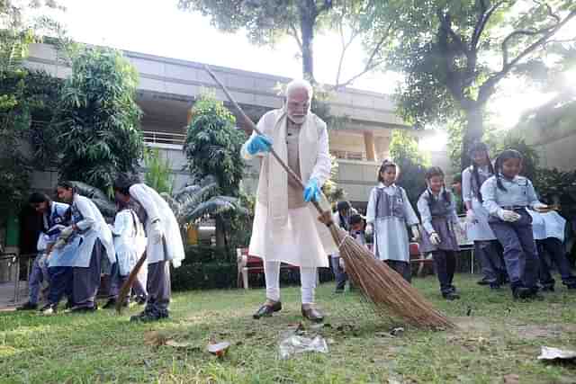 PM Modi on Wednesday participated in Swachh Bharat Abhiyan on the occasion of Gandhi Jayanti at Navyug School, in New Delhi.