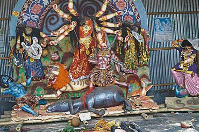 An idol of goddess Durga and her children (Lakshmi, Saraswati, Ganesh, and Kartik) damaged by Islamists in Bangladesh