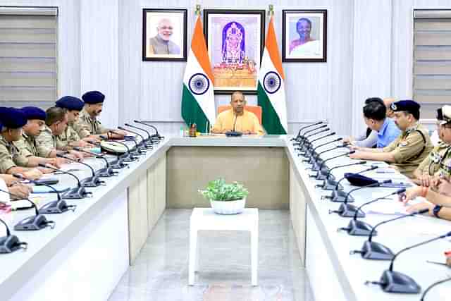 CM Yogi in a meeting with UP police officials (Pic Via X)