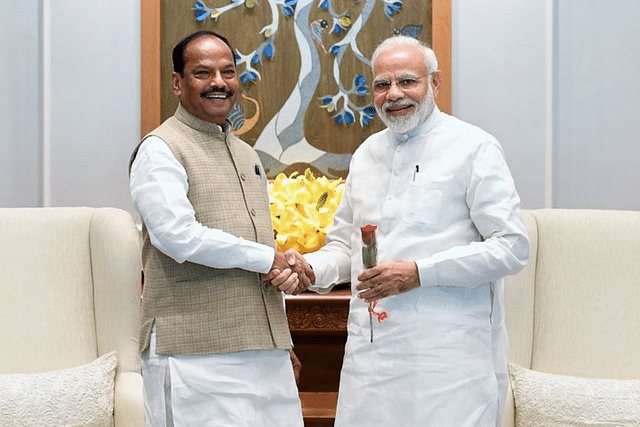 Raghubar Das (left) and Narendra Modi