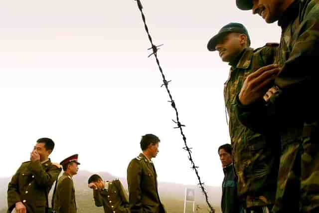 Indian soldiers and Chinese soldiers (Representative Image) (Sumeet Inder Singh/The India Today Group/Getty Images) 