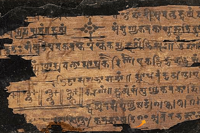 Bakhshali manuscript, with the numeral "zero" represented by a black dot and indicated in this picture (Photo: National Geographic/Wikimedia Commons)