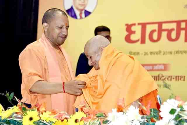 Yogi Adityanath honours cleanliness worker during Kumbh