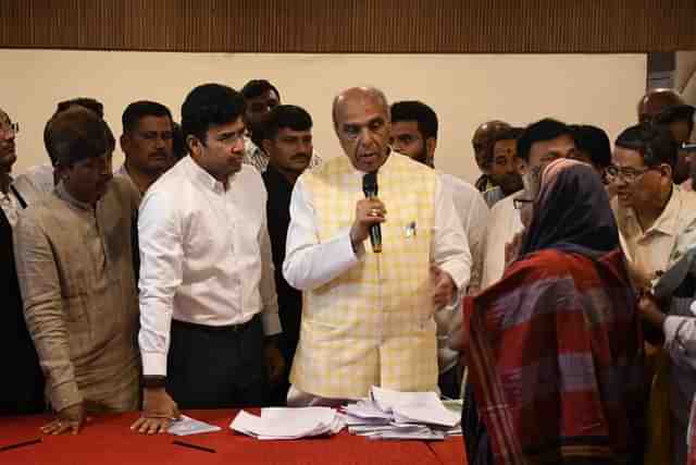 Parliament panel chief Jagdambika Pal with BJP MP Tejasvi Surya and the farmers affected by the Waqf row