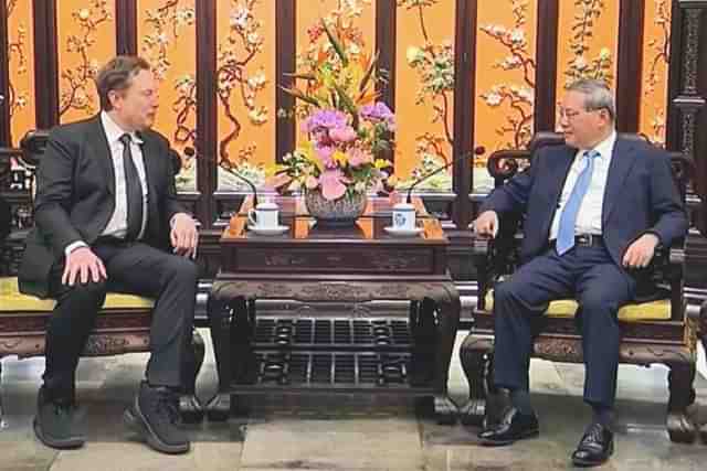 Elon Musk with Chinese Premier Le Qiang