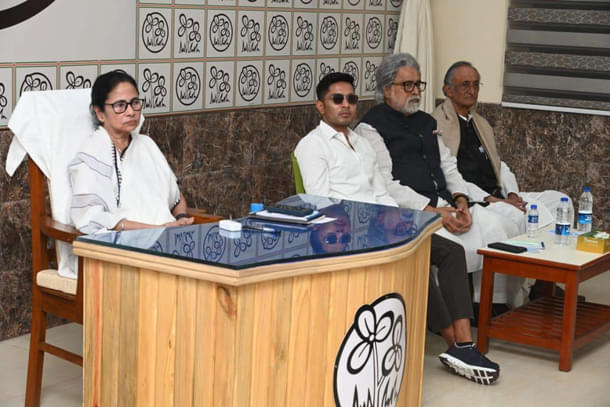 Cold vibes: Mamata Banerjee and nephew Abhishek at the party's core committee meeting at her residence in late November 2024