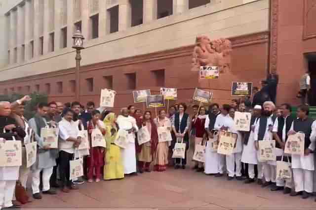Congress MPs with 'Bangladesh' bag outside Parliament