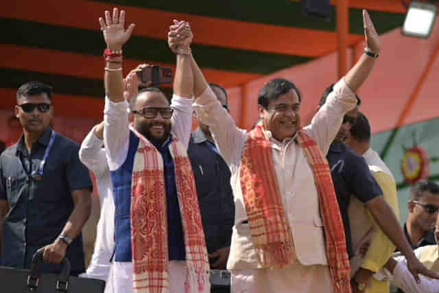 Diplu Ranjan Sarmah with Assam Chief Minister Himanta Biswa Sarma during a rally