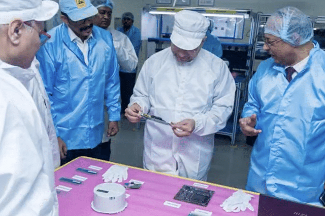 Union Minister Ashwini Vaishnaw (PCB in hand) at the Syrma SGS facility