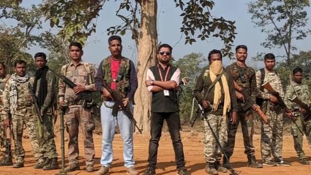 Mukesh Chandrakar with security forces (Photo: NDTV)